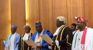 Senator Ahmed Lawan being sworn in as the Senate President of the 9th Assembly.