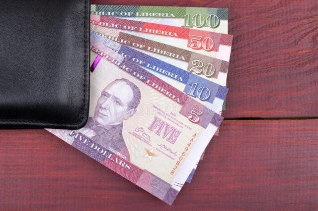 black-wallet-liberian-dollars-wooden-background-black-wallet-liberian-dollars-101796864