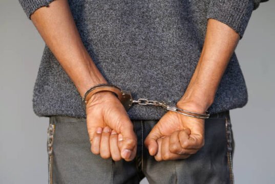 Ekiti Killings: Ex-Convict, Two Others Nabbed. handcuff police istockphoto 1040032446